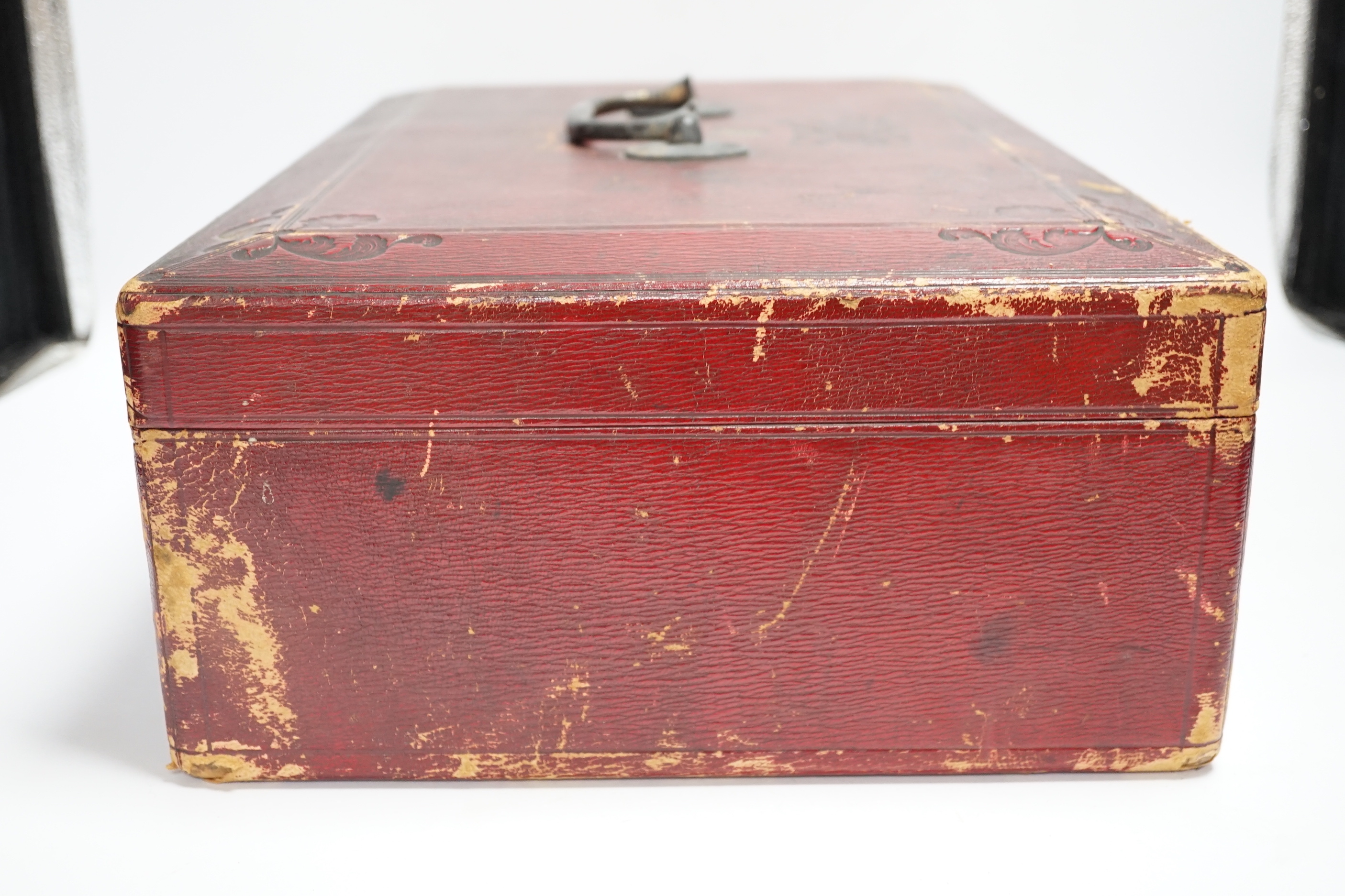 A Victorian red Morocco dispatch box (locked with no key)